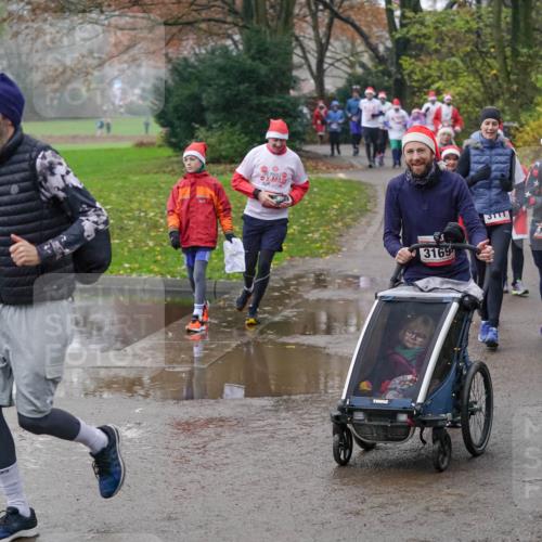 07.12.2025 - St. Pauli X-Mass-Run No. 15 Michael Burmester http://msf.ph/oto/9405538 07.12.2025 11:09:15 Laufen 3169, 3111, 166 meine-sportfotos.de