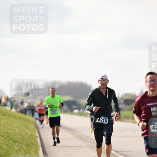 12.04.2026 - 45. Internationalen Wilhelmsburger Insellauf Dr. Thomas Lammeyer http://msf.ph/oto/9440522 12.04.2026 10:05:23 Laufen 5316, 42 meine-sportfotos.de