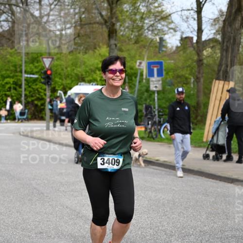 12.04.2026 - 45. Internationalen Wilhelmsburger Insellauf J. Mangold http://msf.ph/oto/9519899 12.04.2026 13:33:55 Ziel 2636, 3409, 3075 meine-sportfotos.de
