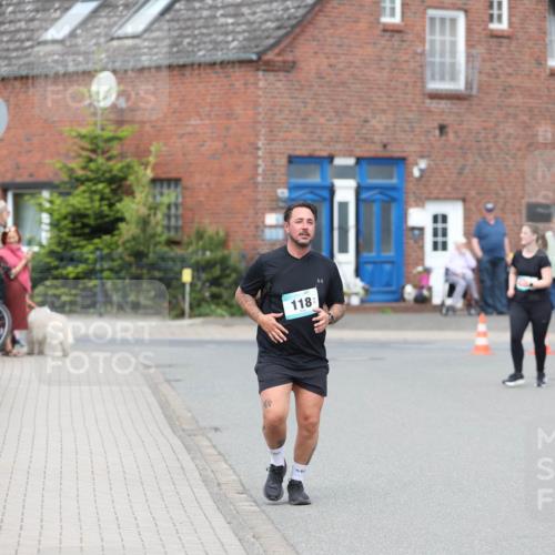 10.05.2026 - 8. Wedeler Halbmarathon Andreas Tolksdorf http://msf.ph/oto/9704237 10.05.2026 10:34:52 Laufen 30, 118 meine-sportfotos.de