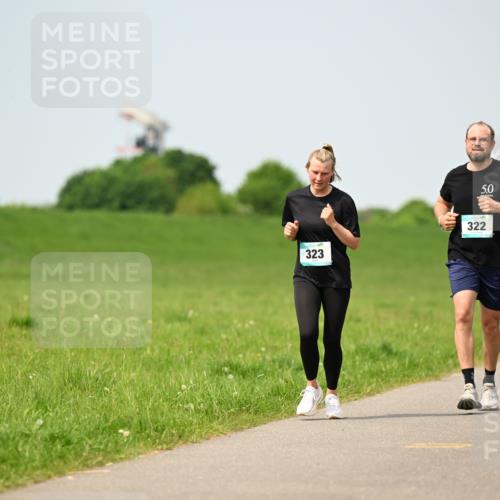 10.05.2026 - 8. Wedeler Halbmarathon Dr. Thomas Lammeyer http://msf.ph/oto/9708659 10.05.2026 12:01:40 Laufen 323, 322 meine-sportfotos.de