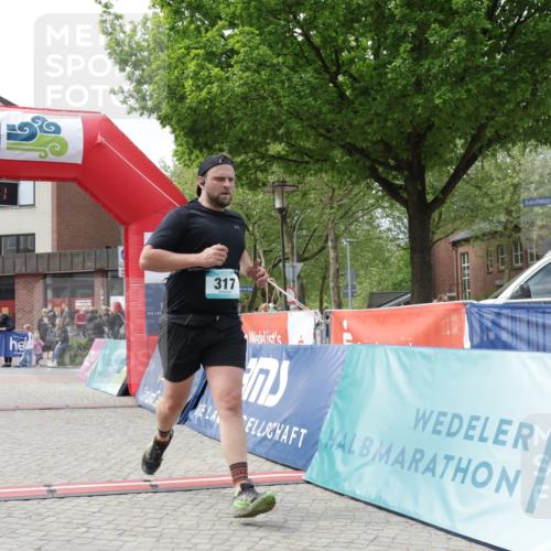 10.05.2026 - 8. Wedeler Halbmarathon Yannick Fuchs http://msf.ph/oto/9725943 10.05.2026 12:08:09 Ziel 317 meine-sportfotos.de