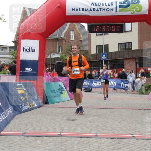 10.05.2026 - 8. Wedeler Halbmarathon Yannick Fuchs http://msf.ph/oto/9734043 10.05.2026 12:37:05 Ziel 2189 meine-sportfotos.de