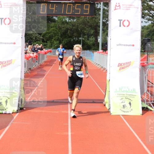 14.06.2026 - 7 Türme Triathlon Andreas Tolksdorf http://msf.ph/oto/9799366 14.06.2026 15:10:57 Ziel 931, 1042 meine-sportfotos.de