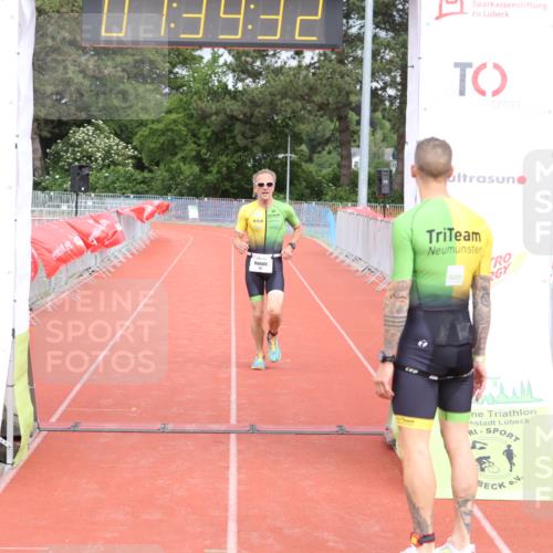14.06.2026 - 7 Türme Triathlon Andreas Tolksdorf http://msf.ph/oto/9802226 14.06.2026 12:09:31 Ziel 460, 461, 462, 463 meine-sportfotos.de