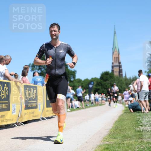 21.06.2026 - Viking Triathlon Michael Strokosch http://msf.ph/oto/9836003 21.06.2026 14:13:56 Laufen 343, 401 meine-sportfotos.de