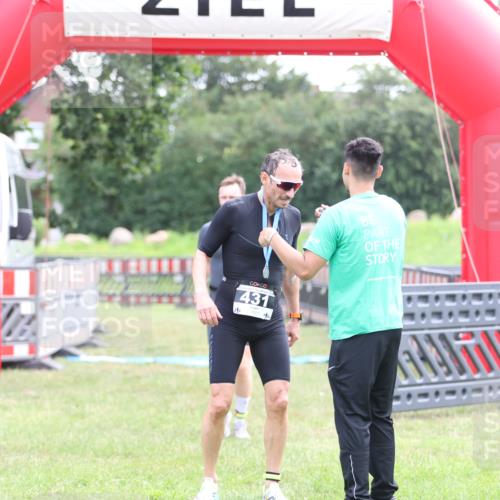 21.06.2026 - 29. Vierlanden-Triathlon Andreas Tolksdorf http://msf.ph/oto/9877550 21.06.2026 11:12:45 Ziel 303, 303 meine-sportfotos.de