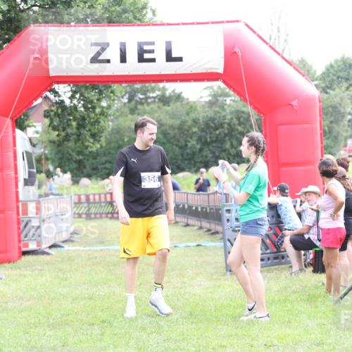 21.06.2026 - 29. Vierlanden-Triathlon Andreas Tolksdorf http://msf.ph/oto/9881467 21.06.2026 11:21:17 Ziel 439, 439 meine-sportfotos.de