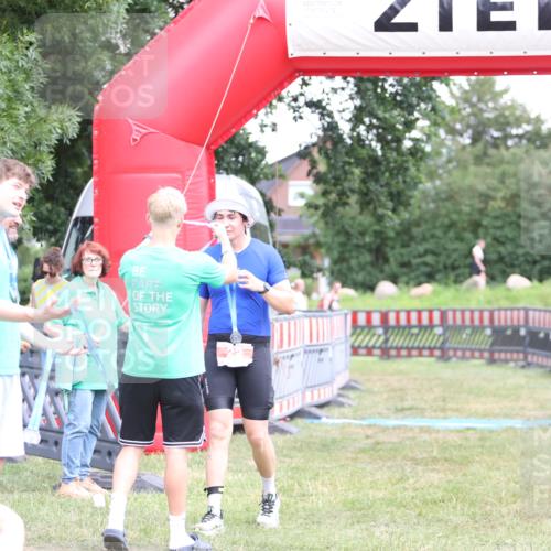 21.06.2026 - 29. Vierlanden-Triathlon Andreas Tolksdorf http://msf.ph/oto/9893463 21.06.2026 14:09:05 Ziel 22, 1126, 22, 1126 meine-sportfotos.de