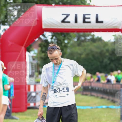 21.06.2026 - 29. Vierlanden-Triathlon Andreas Tolksdorf http://msf.ph/oto/9913658 21.06.2026 11:11:22 Ziel  meine-sportfotos.de