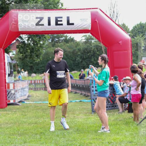 21.06.2026 - 29. Vierlanden-Triathlon Andreas Tolksdorf http://msf.ph/oto/9914245 21.06.2026 11:21:17 Ziel 439 meine-sportfotos.de