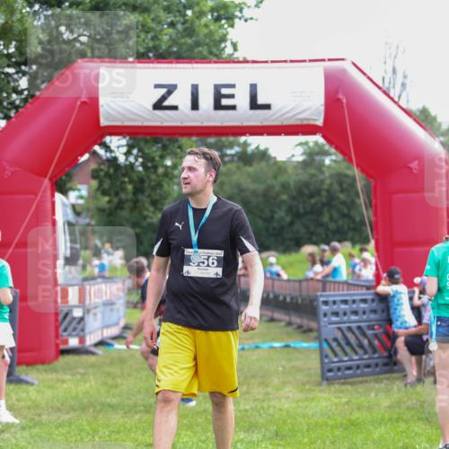 21.06.2026 - 29. Vierlanden-Triathlon Andreas Tolksdorf http://msf.ph/oto/9914254 21.06.2026 11:21:22 Ziel 411, 439 meine-sportfotos.de