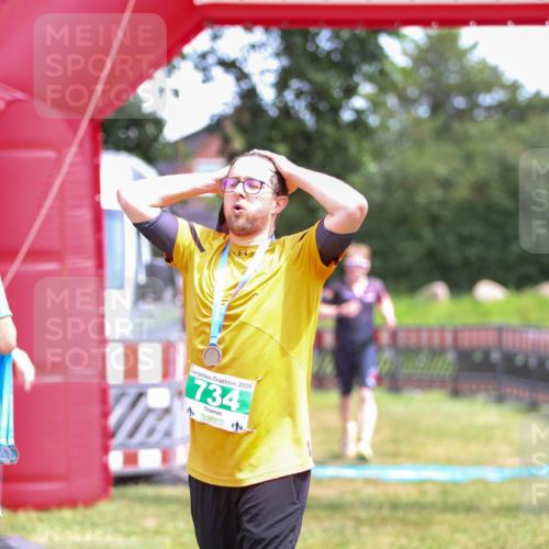 21.06.2026 - 29. Vierlanden-Triathlon Andreas Tolksdorf http://msf.ph/oto/9915748 21.06.2026 14:03:59 Ziel 1078 meine-sportfotos.de