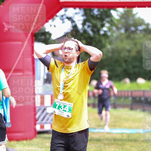 21.06.2026 - 29. Vierlanden-Triathlon Andreas Tolksdorf http://msf.ph/oto/9915751 21.06.2026 14:03:59 Ziel 1078 meine-sportfotos.de