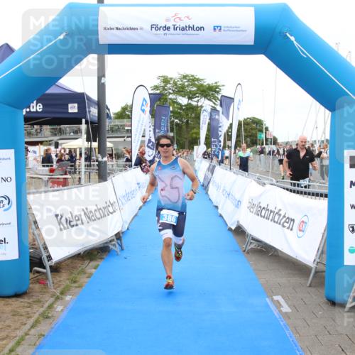 16.08.2026 - KN Förde Triathlon 2026 Markus Tischler http://msf.ph/oto/9998934 16.08.2026 12:10:58 Ziel 386, 386 meine-sportfotos.de